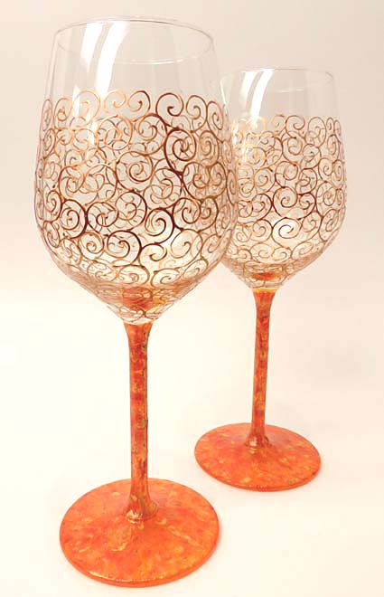 Wijnglas krul goudkleur met oranje/goud voet